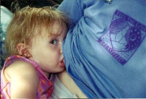 Chloe nursing at the World Walk for Breastfeeding NYC 2002